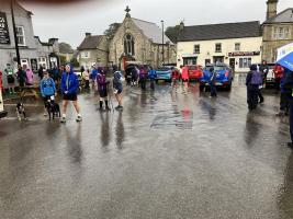 Walkers gather at start in rain